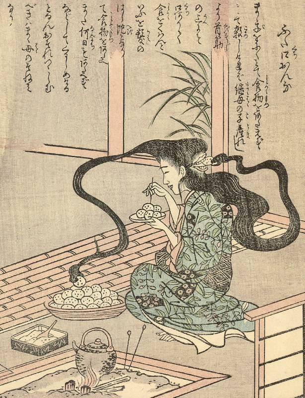 後頭部の髪が手のように伸び、後ろの口に団子を運ぶ女の妖怪の絵