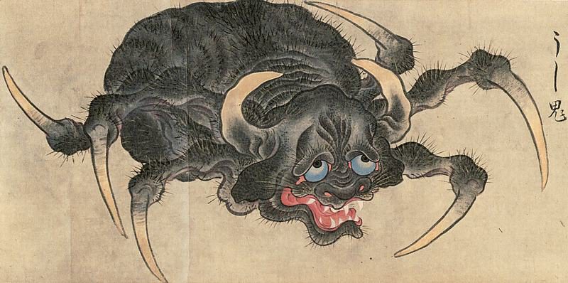 牛のような頭に角が生え、蜘蛛のような体と脚をもつ黒い妖怪の絵巻